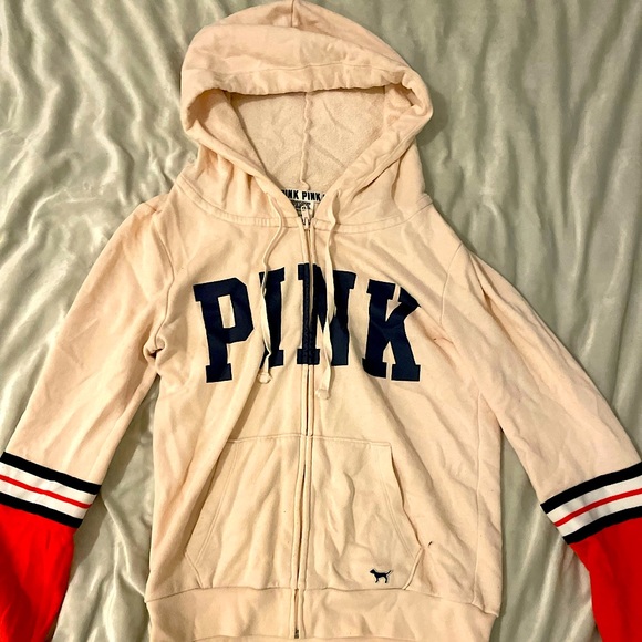 Light pink hoodie with orange and blue stripes on bottom sleeve. - Picture 3 of 3